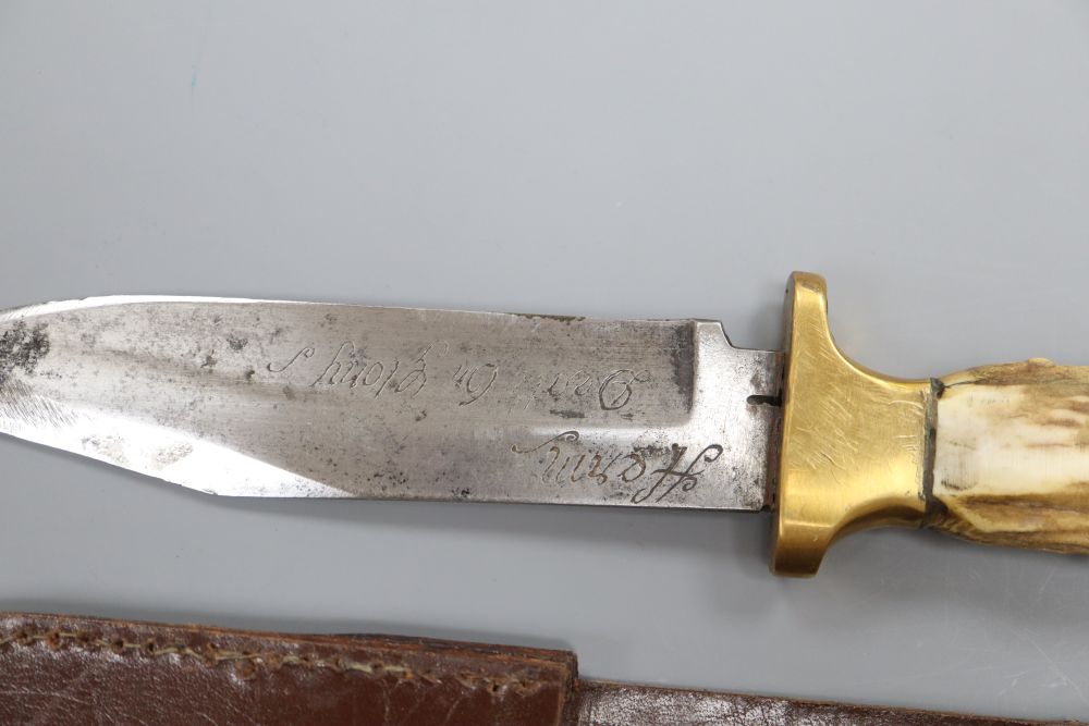 A Fairbairn and Sykes third pattern commando knife, an antler handled knife, blade inscribed Hern, Death or Glory and another knife